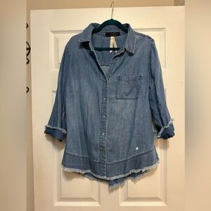 Great denim shirt that goes with everything!